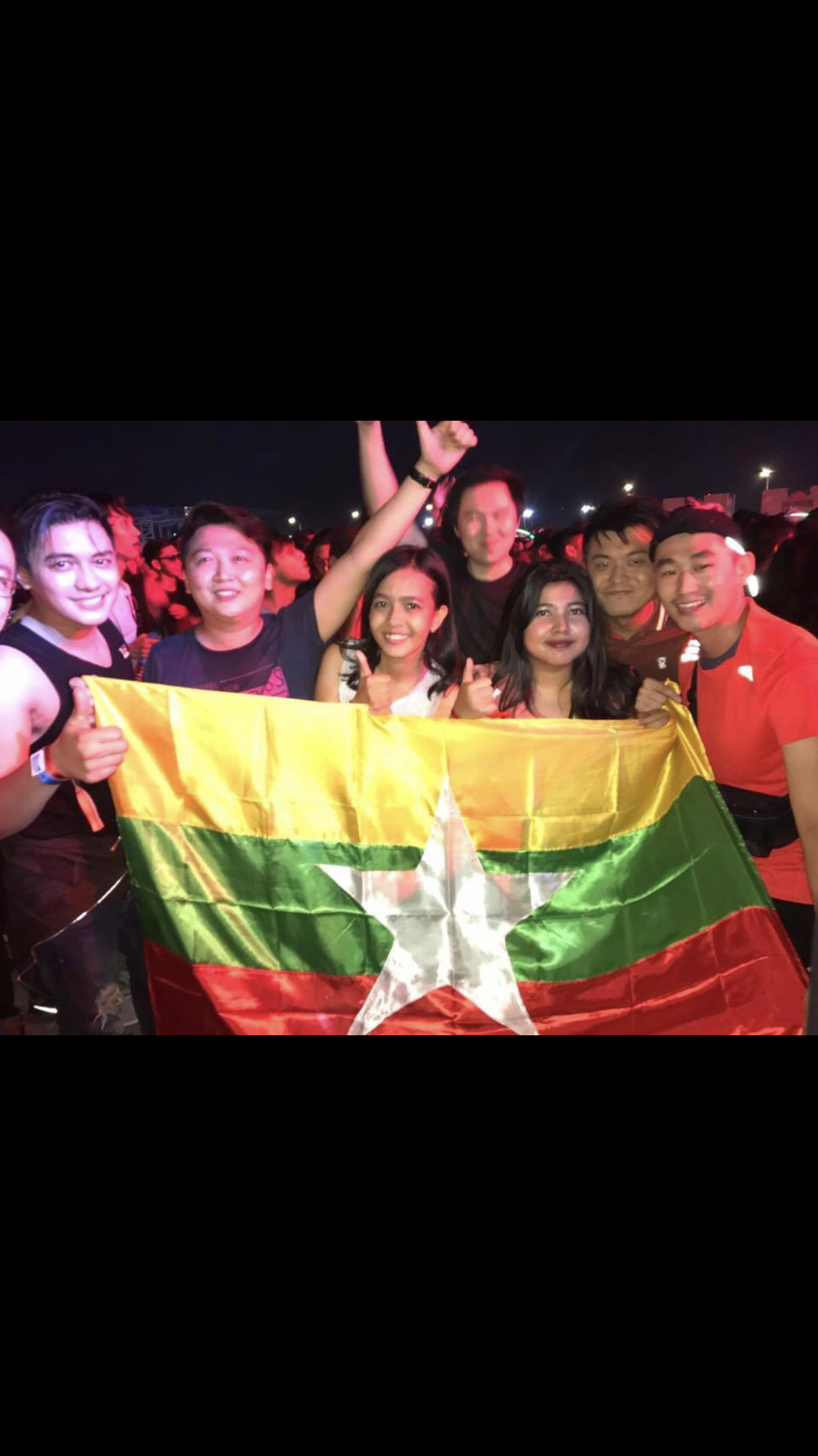 Paing with Myanmar flag at EDM